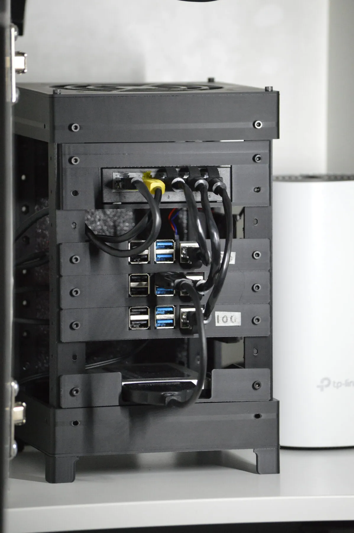 Front view of a three-node Raspberry Pi cluster in a custom enclosure